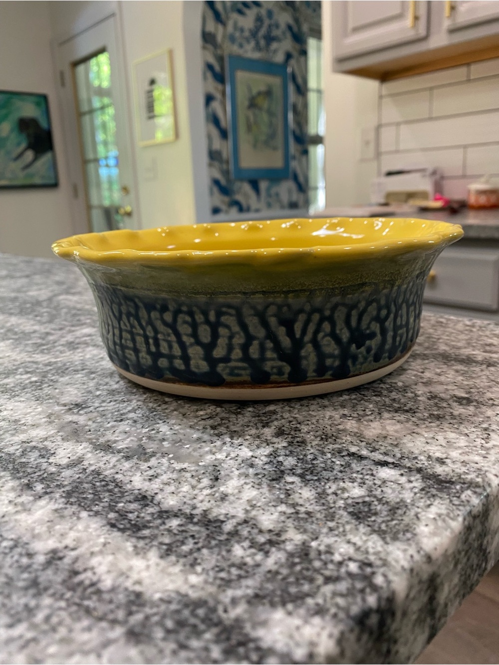 Gorgeous hand made pottery bowl in  green and blue with yellow inside